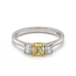 Platinum Cushion Yellow Diamond and Brilliant Cut Three Stone Ring