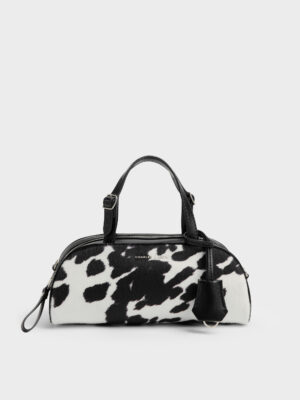 CHARLES & KEITH - Vega Furry Cow-Print Elongated Bowling Bag